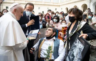 Pope Francis greets endurance athlete Michael Haddad at the general audience in the San Damaso Courtyard of the Apostolic Palace, June 2, 2021. Vatican Media.